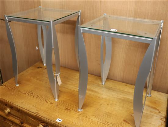 A pair of metal and glass bedside tables H.55.5cm